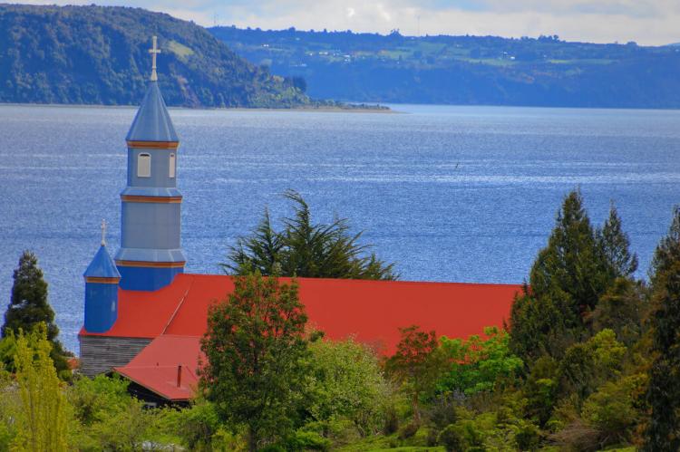 View of church steeple and landscape, Island of Chiloe, Chile