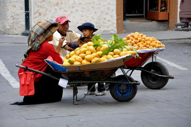 Wheelbarrows of fruit on the streets of Cuenca, Ecuador