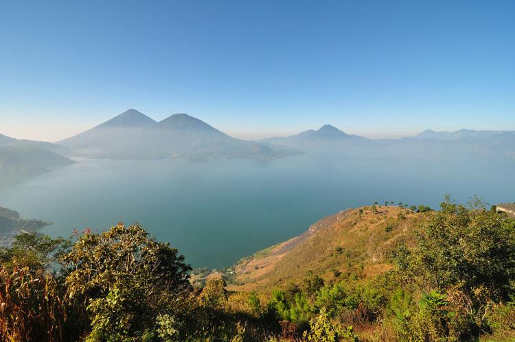 Panorama of Lake Atitlan, Guatemala with volcanoes in background