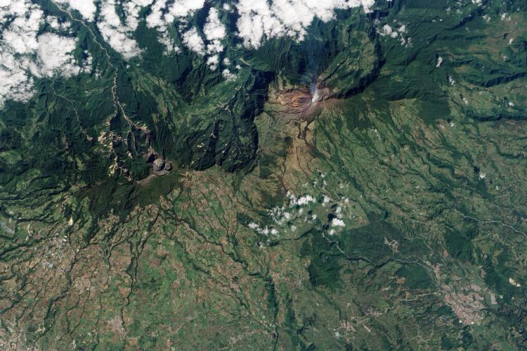 Turrialba Volcano, located in central Costa Rica, emits a translucent plume of volcanic gases in this natural-color satellite image from January 21, 2010