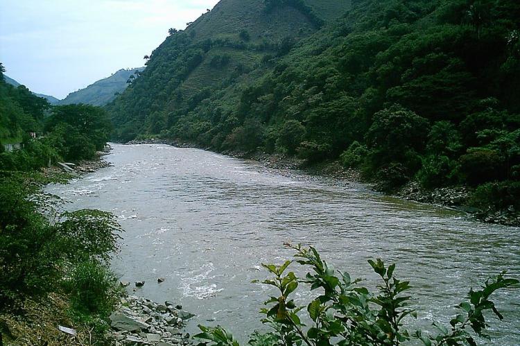 Cauca River, as it passes between the departments of Caldas and Antioquia, Colombia