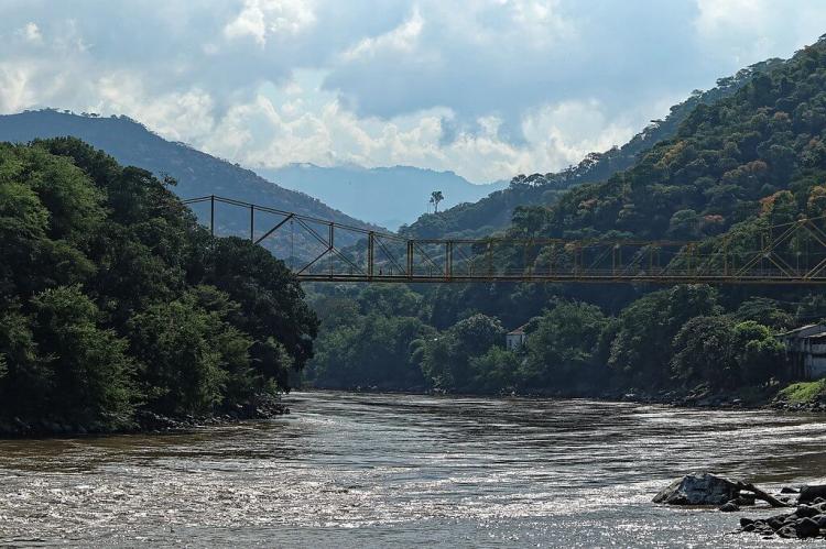 Magdalena River forested countryside and bridge, Colombia