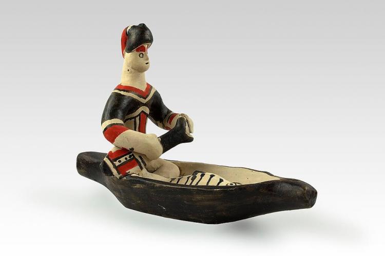 Indigenous Karajà statuette, "man in boat with fish", Bananal island, Araguaia River, state of Tocantins, Brazil