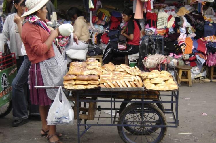 A woman street vendor selling bread in Cochabamba, Bolivia