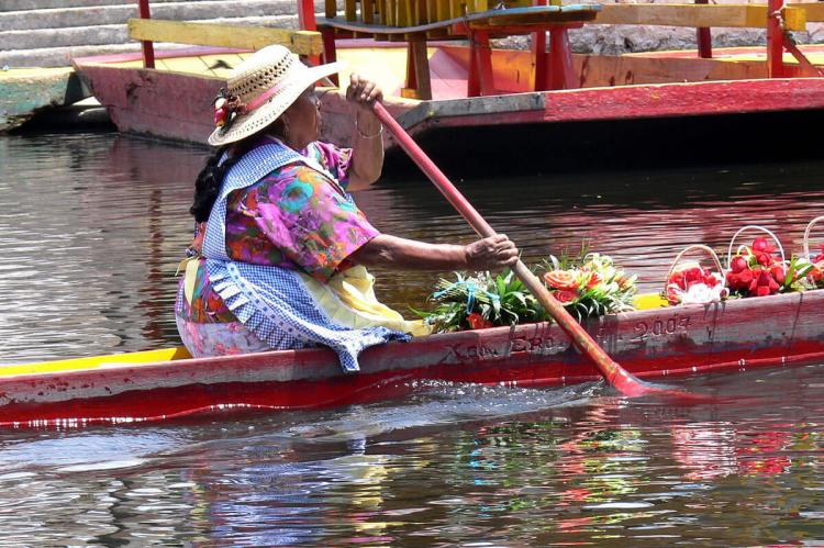 Flower vendor. canals of Xochimilco, Mexico