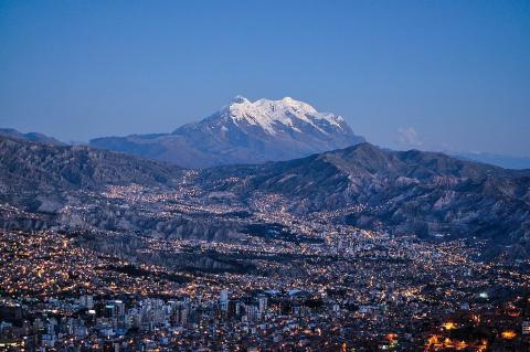 View of La Paz from El Alto with the Illimani mountain in the background, Bolivia