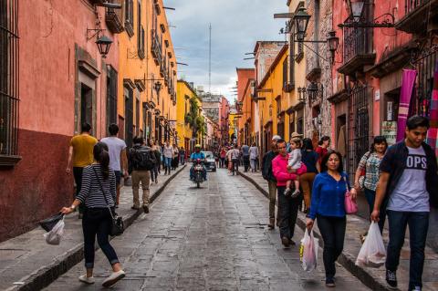Shoppers on street in San Miguel de Allende, Mexico
