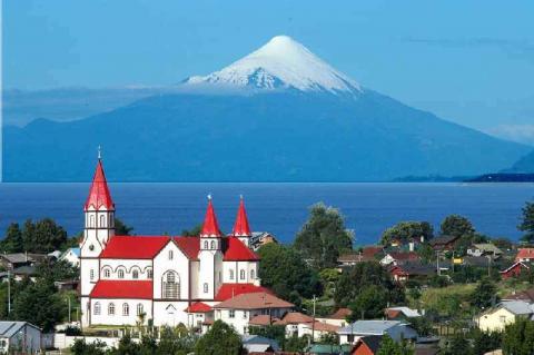 View of Puerto Varas, Los Lagos Region, with Osorno Volcano and Llanquihue Lake in the background, Chile