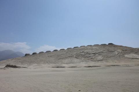 Panoramic view of the thirteen towers of the Chankillo astronomical observatory in Casma, Peru