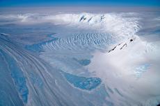 Ice flowing from the Transantarctic Mountains, a range that runs the length of the continent and separates West Antarctica and East Antarctica
