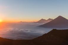 View Fuego, Acatenango and Agua volcanoes from the Pacaya volcano on the Central American Volcanic Arc, Guatemala